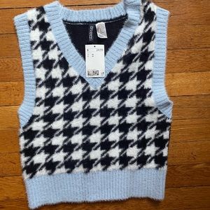 houndstooth sweater vest with blue trim